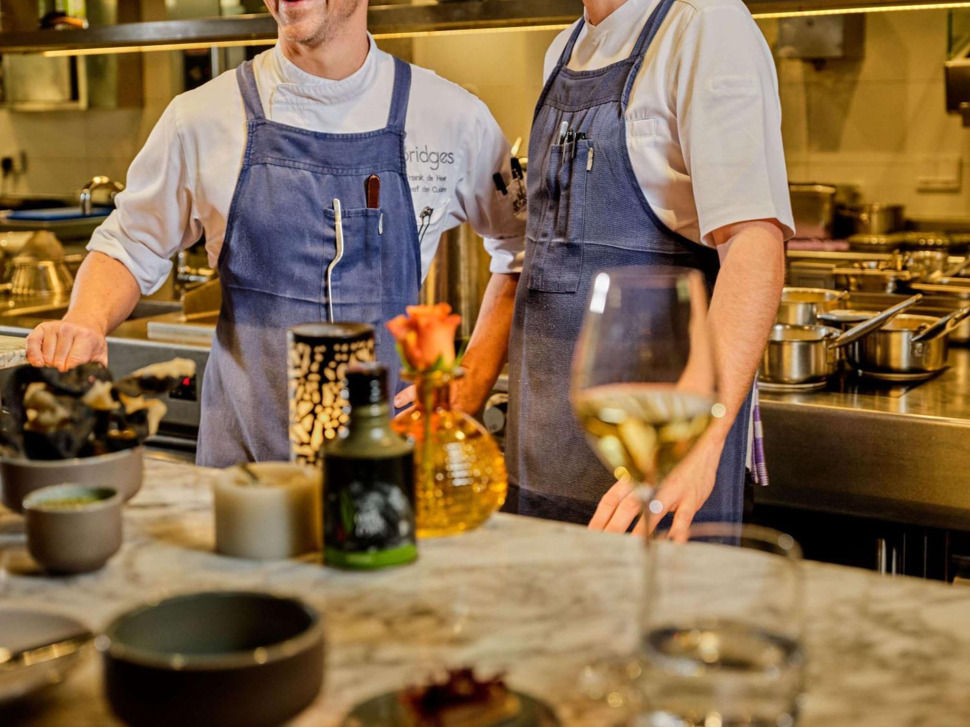 Sofitel Legend The Grand Amsterdam Hotel Ngoại thất bức ảnh Two chefs in a restaurant kitchen